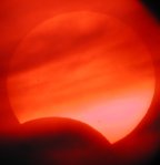 A partial eclipse of the Sun by the Moon will happen in the early evening of July 21st, 2009